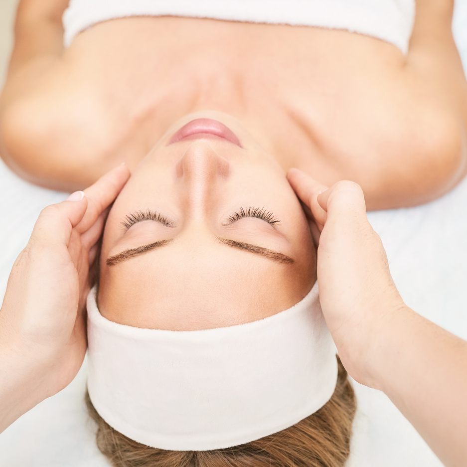 Woman Getting a Facial Massage  